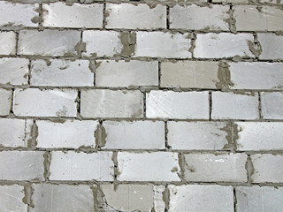 white brick wall, construction background details