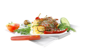 cannelloni with cheese on square white plate