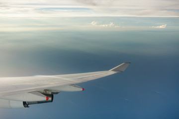 Fototapeta na wymiar clouds and sea view from airplane
