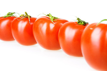Tomatoes isolated on white background.