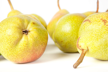 heap of fresh tasty pears on white background