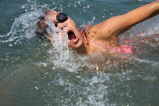 Woman Swimmer In Sea