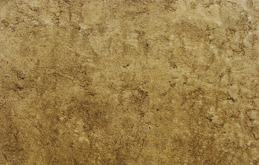 worn old dirty beige brown stone wall