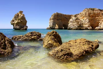 Fotobehang Marinha Beach, Algarve, Portugal Rotsachtige kust