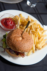 hamburger with fries and ketchup