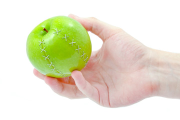 green apple in hand
