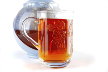 tea in glass and kettle