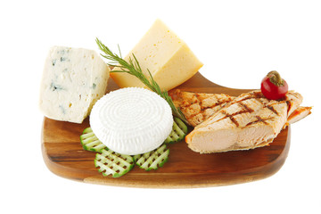 cheeses and salmon on wood