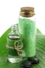 Bath salt and palm leaf