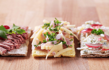 Crackers with different toppings