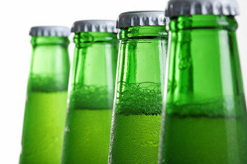 Beer in bottle on a white background .