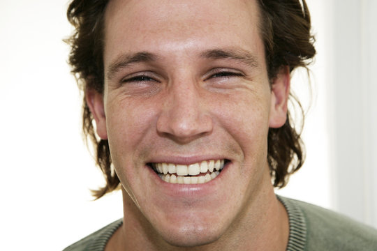 Portrait of male laughing at camera