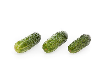 Three pickles isolated on a white background
