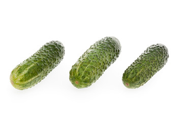 Three pickles isolated on a white background
