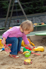 little child playing on playground