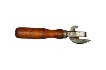 Old dirty, rusty can opener with wood handle isolated