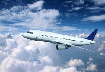 Fototapeta na wymiar Samolot nad chmurami