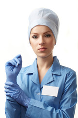 medical doctor in blue medical gloves