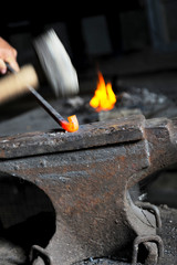blacksmith forges iron