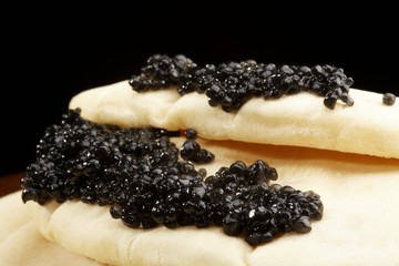 Caviar black with pancakes, a pancake week