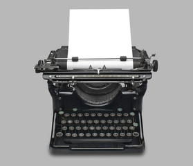 Vintage typewriter and paper, isolated