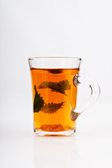 Caramel tea with brown sugar and springs of mint