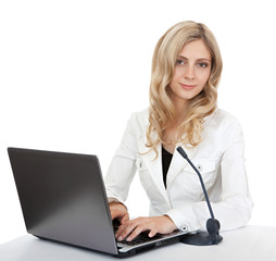 Beautiful business woman with a laptop