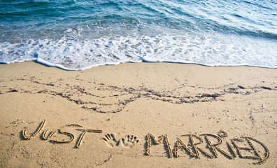 Just Married written in the Sand