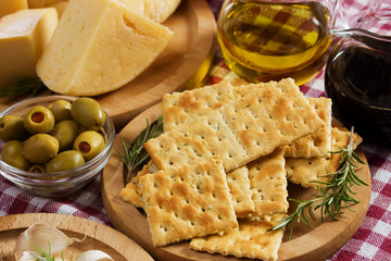 Crackers with cheese and olives