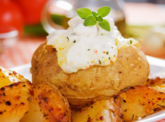 Baked potato with sour cream sauce