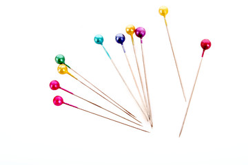 Many pins isolated on white