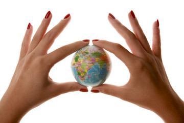 Womans hands holding small world - Globe - Business