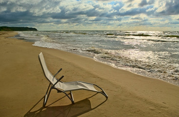Chair on the sand.