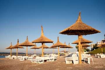 Thatched umbrellas on the beach