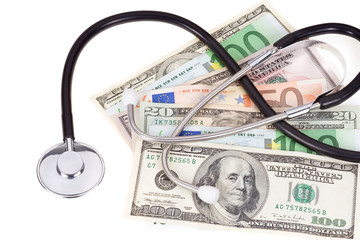 dollars and euros with stethoscope