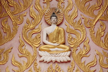 Fototapeta na wymiar buddha on gable, Wat Charoenphon, Tha Kon Yang, Kantarawichai