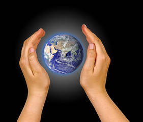 Hands with planet earth