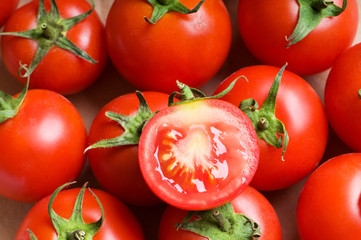 Red tomatoes arranged at the market stand