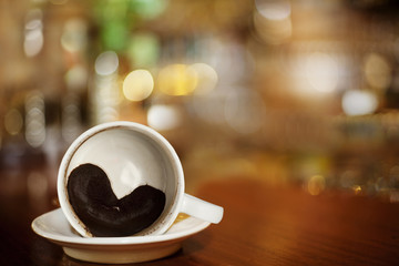 coffee cup with heart on Bar