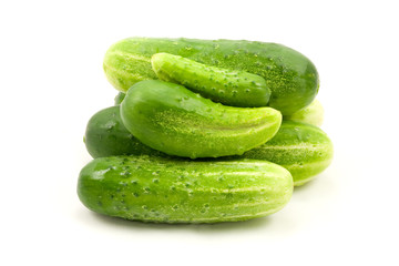 Fresh cucumbers fruits isolated on white background