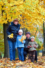 Family in autumn park