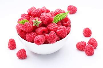 Crockery with  beautiful tempting raspberries.