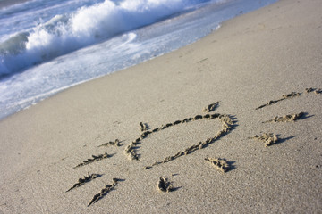 Sun Symbol in Sand