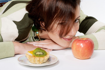 Diet  temptation - cake against apple