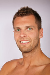 Obraz premium Smiling young man.