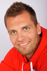 Portrait of young man with green eyes