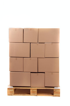 cardboard boxes on wooden palette
