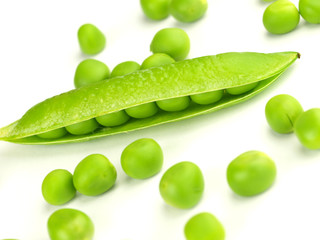 Fresh peas on white background