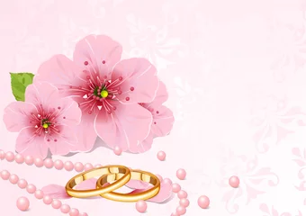 Fotobehang Wedding rings and cherry blossom © Anna Velichkovsky