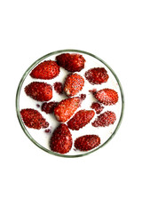 Strawberry in milk isolated on white
